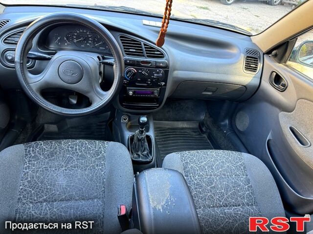 Зеленый Дэу Ланос, объемом двигателя 1.5 л и пробегом 200 тыс. км за 1450 $, фото 6 на Automoto.ua