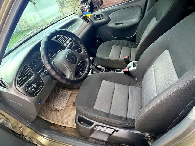 Зеленый Дэу Ланос, объемом двигателя 1.5 л и пробегом 253 тыс. км за 3300 $, фото 12 на Automoto.ua