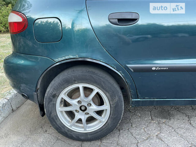 Зеленый Дэу Ланос, объемом двигателя 1.5 л и пробегом 325 тыс. км за 1800 $, фото 3 на Automoto.ua