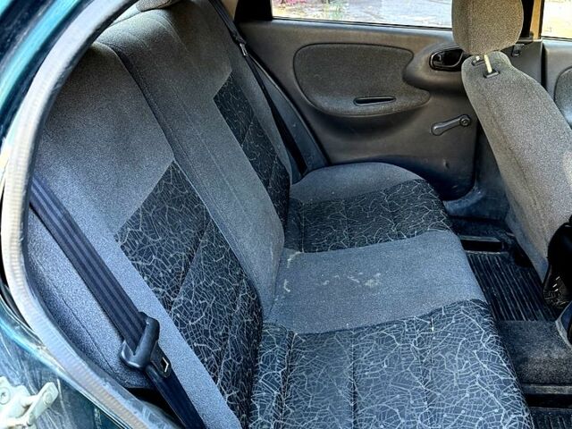 Зеленый Дэу Ланос, объемом двигателя 1.5 л и пробегом 200 тыс. км за 1450 $, фото 8 на Automoto.ua