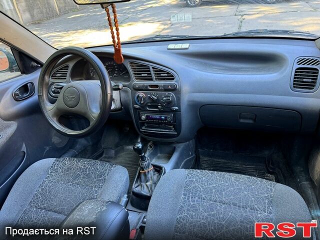 Зеленый Дэу Ланос, объемом двигателя 1.5 л и пробегом 200 тыс. км за 1450 $, фото 7 на Automoto.ua