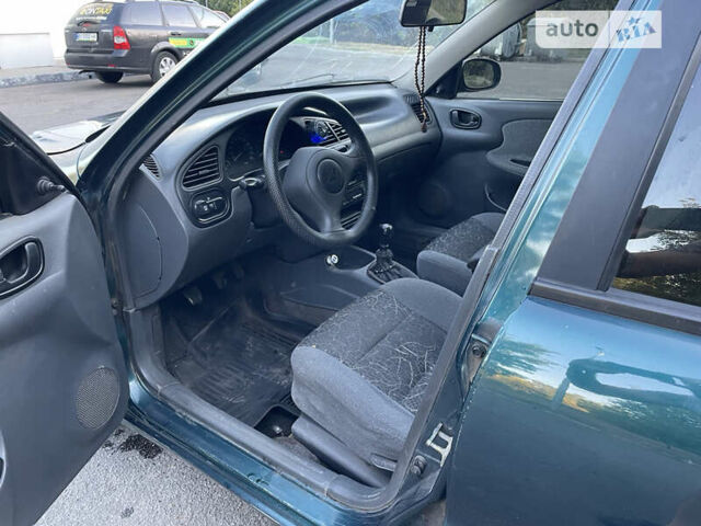 Зеленый Дэу Ланос, объемом двигателя 1.5 л и пробегом 325 тыс. км за 1800 $, фото 7 на Automoto.ua