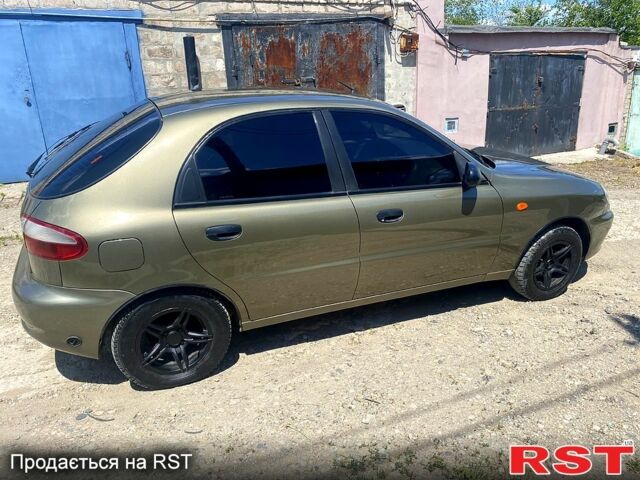 Зеленый Дэу Ланос, объемом двигателя 1.5 л и пробегом 253 тыс. км за 3300 $, фото 5 на Automoto.ua