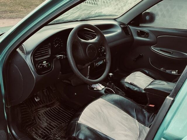 Зеленый Дэу Ланос, объемом двигателя 1.5 л и пробегом 300 тыс. км за 1100 $, фото 3 на Automoto.ua