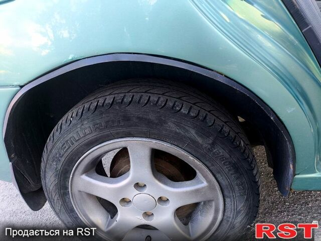 Зеленый Дэу Ланос, объемом двигателя 1.5 л и пробегом 280 тыс. км за 2200 $, фото 2 на Automoto.ua