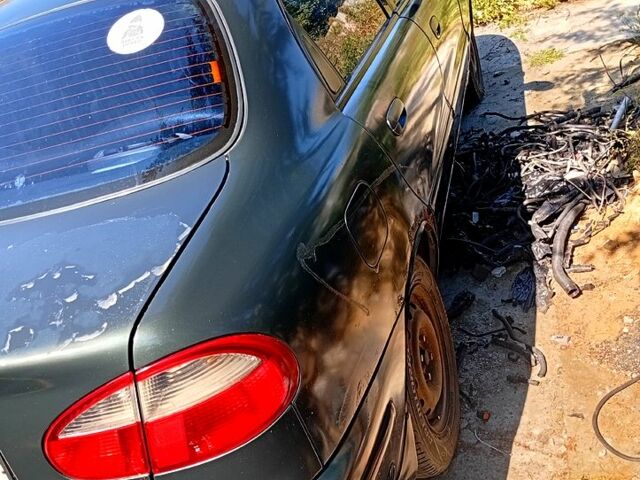 Зелений Деу Ланос, об'ємом двигуна 1.5 л та пробігом 300 тис. км за 900 $, фото 4 на Automoto.ua