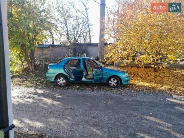 Зелений Деу Ланос, об'ємом двигуна 1.5 л та пробігом 240 тис. км за 3200 $, фото 10 на Automoto.ua