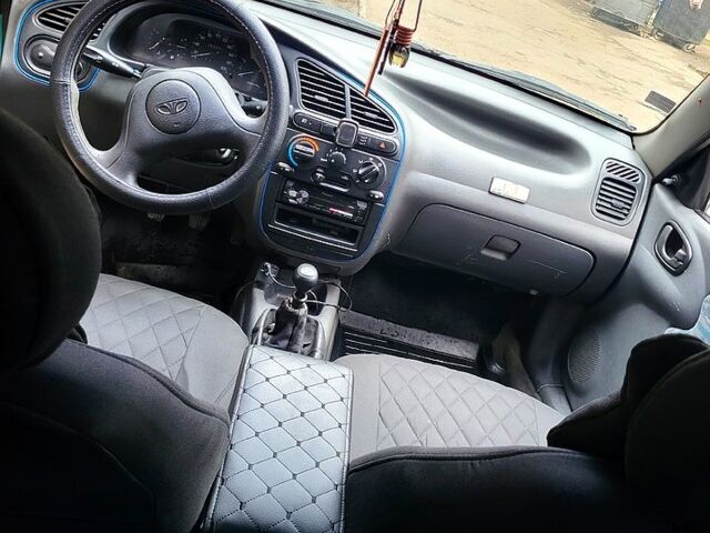 Зеленый Дэу Ланос, объемом двигателя 1.5 л и пробегом 350 тыс. км за 2700 $, фото 5 на Automoto.ua