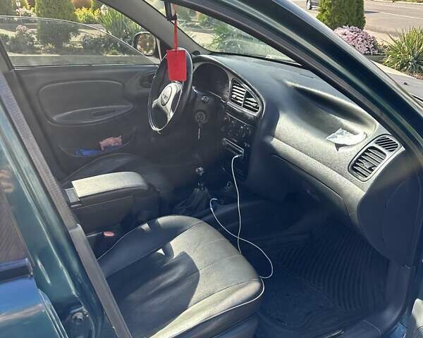 Дэу Ланос 1998 в Одессе на Automoto.ua Зеленый Дэу Ланос, объемом двигателя 1.5 л и пробегом 190 тыс. км за 1550 $, фото 5 на Automoto.ua