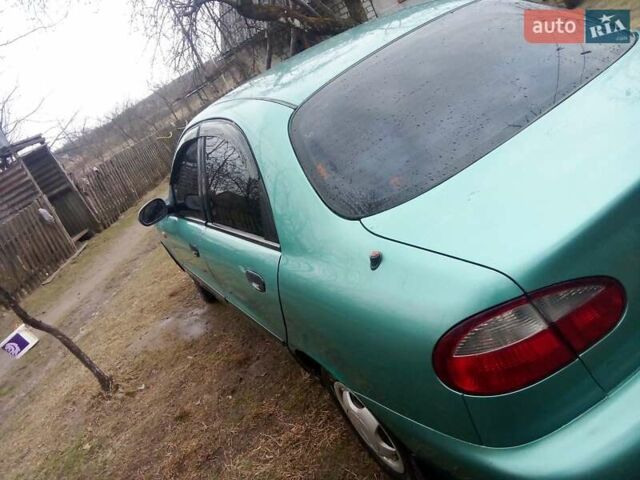 Зеленый Дэу Ланос, объемом двигателя 1.5 л и пробегом 300 тыс. км за 1000 $, фото 6 на Automoto.ua