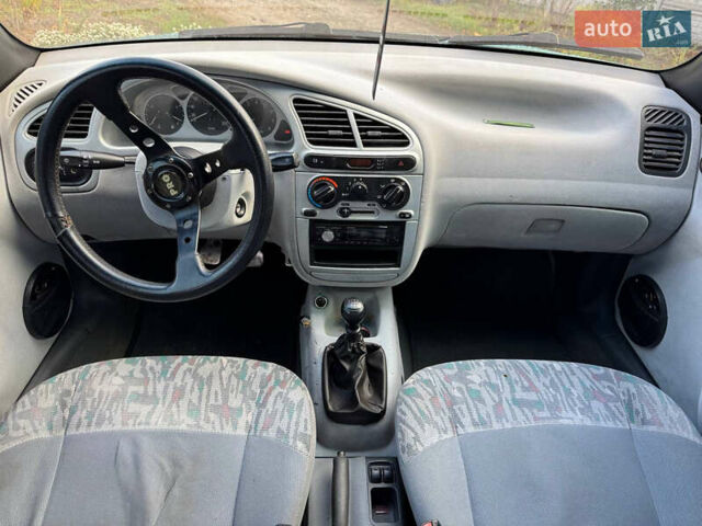 Зеленый Дэу Ланос, объемом двигателя 2 л и пробегом 220 тыс. км за 2900 $, фото 7 на Automoto.ua