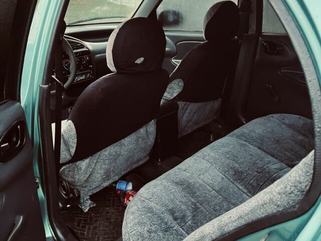 Зеленый Дэу Ланос, объемом двигателя 1.5 л и пробегом 300 тыс. км за 1100 $, фото 5 на Automoto.ua