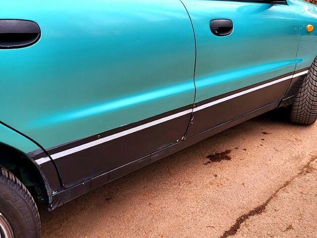 Зеленый Дэу Ланос, объемом двигателя 1.5 л и пробегом 350 тыс. км за 2700 $, фото 4 на Automoto.ua