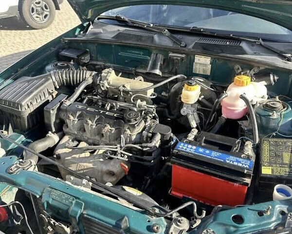 Зеленый Дэу Ланос, объемом двигателя 1.5 л и пробегом 215 тыс. км за 1900 $, фото 7 на Automoto.ua