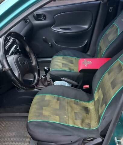 Деу Ланос 1998 у Ужгороді на Automoto.ua Зелений Деу Ланос, об'ємом двигуна 1.5 л та пробігом 350 тис. км за 1200 $, фото 6 на Automoto.ua