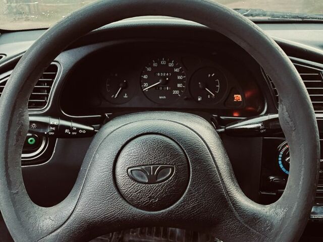 Зеленый Дэу Ланос, объемом двигателя 1.5 л и пробегом 300 тыс. км за 1100 $, фото 4 на Automoto.ua