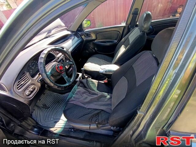 Дэу Ланос 1998 в Запорожье на Automoto.ua Зеленый Дэу Ланос, объемом двигателя 1.5 л и пробегом 200 тыс. км за 1800 $, фото 2 на Automoto.ua