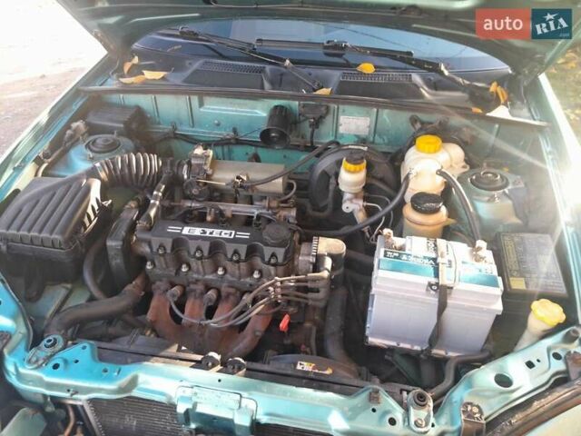 Зелений Деу Ланос, об'ємом двигуна 1.5 л та пробігом 240 тис. км за 3200 $, фото 9 на Automoto.ua