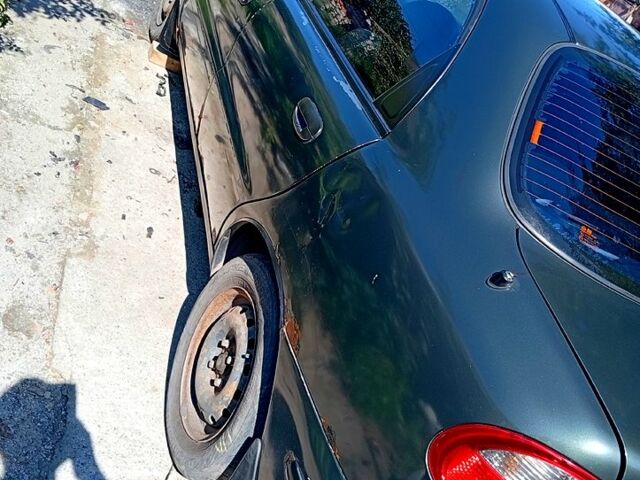 Зелений Деу Ланос, об'ємом двигуна 1.5 л та пробігом 300 тис. км за 900 $, фото 6 на Automoto.ua