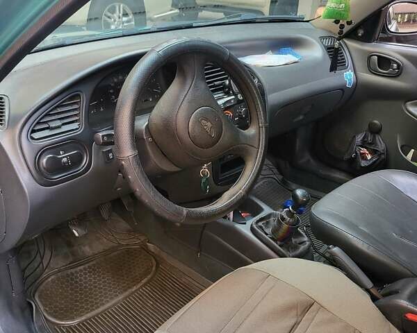 Зеленый Дэу Ланос, объемом двигателя 1.5 л и пробегом 268 тыс. км за 1200 $, фото 8 на Automoto.ua