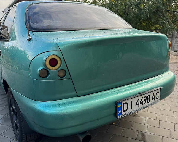 Зеленый Дэу Ланос, объемом двигателя 2 л и пробегом 220 тыс. км за 2900 $, фото 9 на Automoto.ua