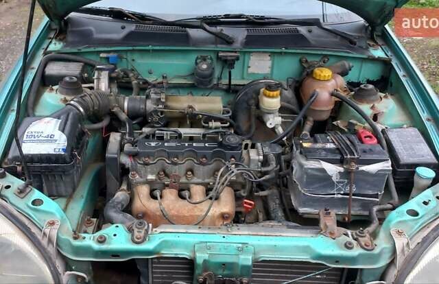 Деу Ланос 1998 у Ужгороді на Automoto.ua Зелений Деу Ланос, об'ємом двигуна 1.5 л та пробігом 350 тис. км за 1200 $, фото 4 на Automoto.ua
