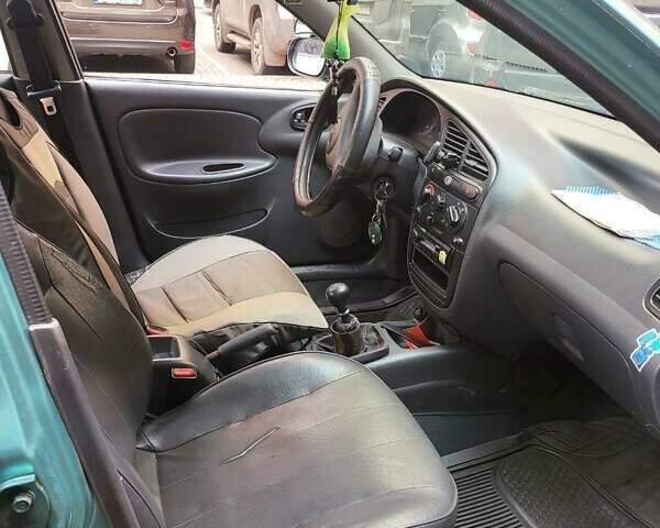 Зеленый Дэу Ланос, объемом двигателя 1.5 л и пробегом 268 тыс. км за 1200 $, фото 9 на Automoto.ua