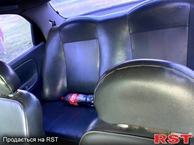 Зелений Деу Ланос, об'ємом двигуна 1.5 л та пробігом 300 тис. км за 1350 $, фото 2 на Automoto.ua