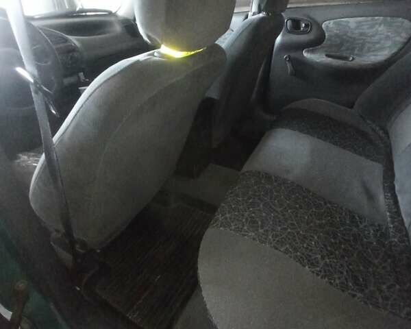 Зеленый Дэу Ланос, объемом двигателя 1.5 л и пробегом 250 тыс. км за 1900 $, фото 13 на Automoto.ua