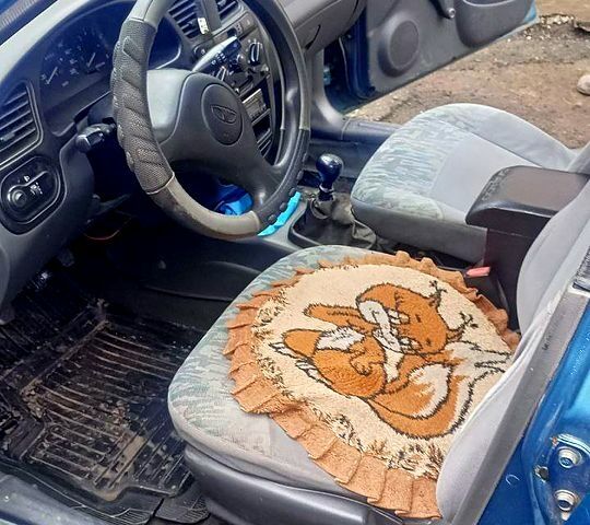 Зеленый Дэу Ланос, объемом двигателя 1.5 л и пробегом 300 тыс. км за 1600 $, фото 5 на Automoto.ua