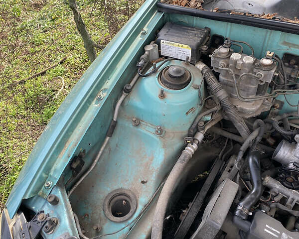 Зеленый Дэу Ланос, объемом двигателя 1.5 л и пробегом 250 тыс. км за 1200 $, фото 11 на Automoto.ua