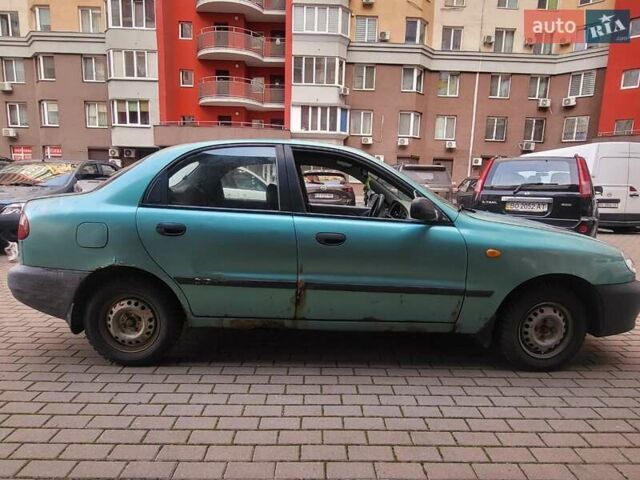 Зеленый Дэу Ланос, объемом двигателя 1.5 л и пробегом 268 тыс. км за 1200 $, фото 4 на Automoto.ua