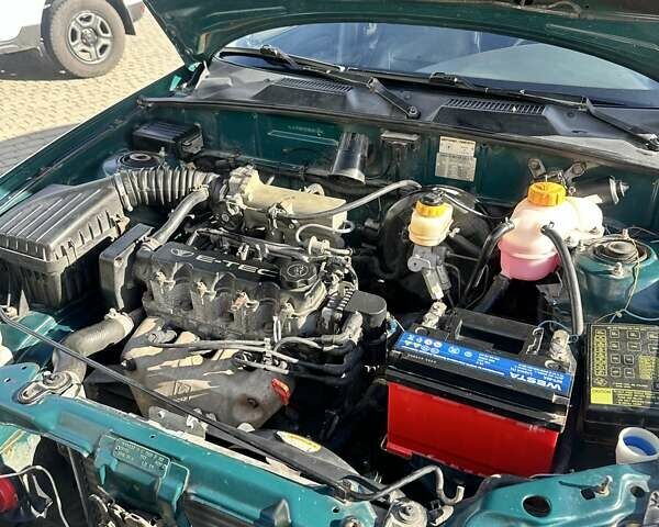 Дэу Ланос 1998 в Одессе на Automoto.ua Зеленый Дэу Ланос, объемом двигателя 1.5 л и пробегом 190 тыс. км за 1550 $, фото 6 на Automoto.ua