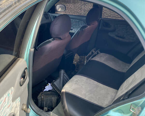 Зеленый Дэу Ланос, объемом двигателя 1.5 л и пробегом 250 тыс. км за 1200 $, фото 5 на Automoto.ua