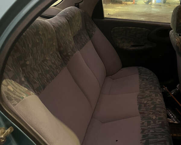 Зелений Деу Ланос, об'ємом двигуна 1.5 л та пробігом 240 тис. км за 2400 $, фото 9 на Automoto.ua