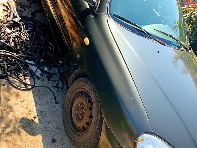 Зелений Деу Ланос, об'ємом двигуна 1.5 л та пробігом 300 тис. км за 900 $, фото 3 на Automoto.ua