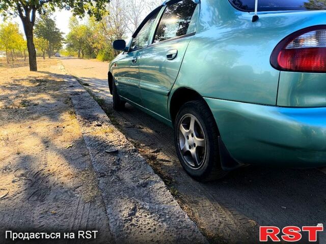 Зеленый Дэу Ланос, объемом двигателя 1.5 л и пробегом 280 тыс. км за 2200 $, фото 3 на Automoto.ua