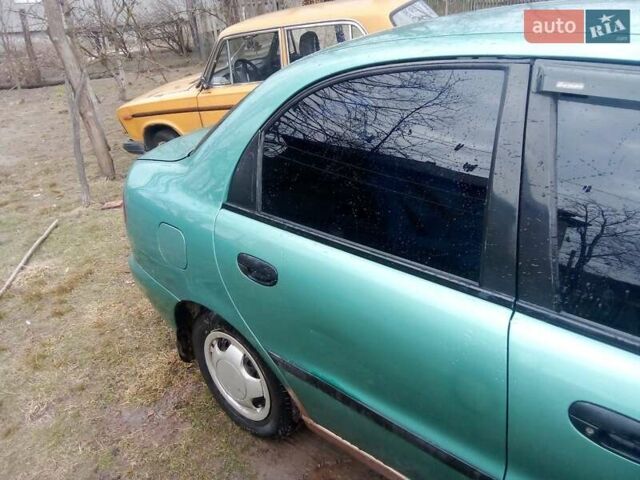 Зеленый Дэу Ланос, объемом двигателя 1.5 л и пробегом 300 тыс. км за 1000 $, фото 1 на Automoto.ua