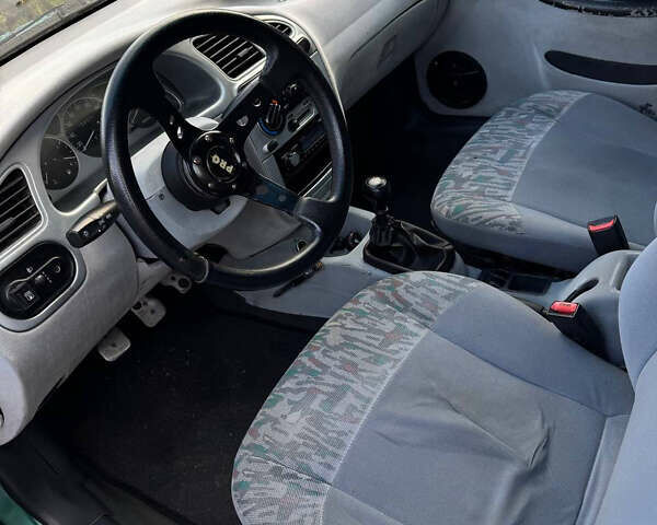 Зеленый Дэу Ланос, объемом двигателя 2 л и пробегом 220 тыс. км за 2900 $, фото 5 на Automoto.ua