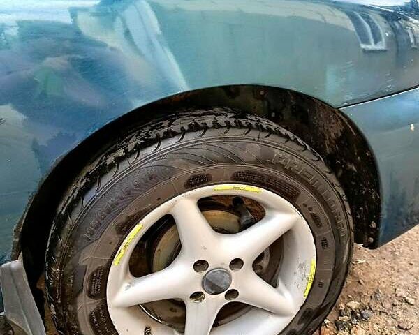 Зеленый Дэу Ланос, объемом двигателя 1.5 л и пробегом 120 тыс. км за 1550 $, фото 6 на Automoto.ua