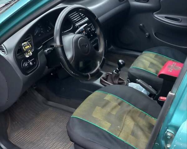 Деу Ланос 1998 у Ужгороді на Automoto.ua Зелений Деу Ланос, об'ємом двигуна 1.5 л та пробігом 350 тис. км за 1200 $, фото 7 на Automoto.ua