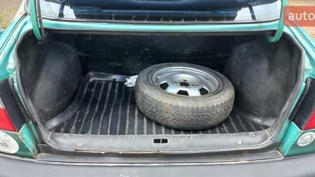 Деу Ланос 1998 у Ужгороді на Automoto.ua Зелений Деу Ланос, об'ємом двигуна 1.5 л та пробігом 350 тис. км за 1200 $, фото 13 на Automoto.ua