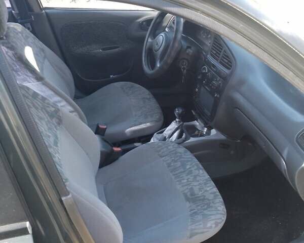 Дэу Ланос 1998 в Херсоне на Automoto.ua Зеленый Дэу Ланос, объемом двигателя 1.5 л и пробегом 380 тыс. км за 1500 $, фото 2 на Automoto.ua