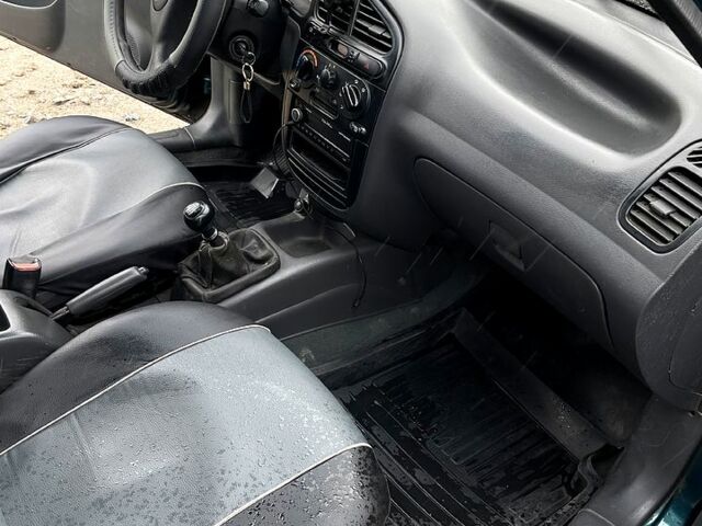 Дэу Ланос 1998 в Днепре (Днепропетровске) на Automoto.ua Зеленый Дэу Ланос, объемом двигателя 1.5 л и пробегом 0 тыс. км за 1650 $, фото 2 на Automoto.ua