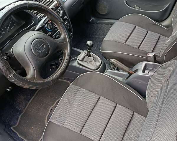 Зелений Деу Ланос, об'ємом двигуна 1.5 л та пробігом 390 тис. км за 2000 $, фото 7 на Automoto.ua