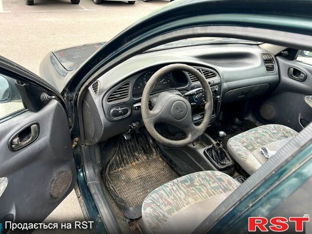 Зелений Деу Ланос, об'ємом двигуна 1.5 л та пробігом 221 тис. км за 950 $, фото 7 на Automoto.ua