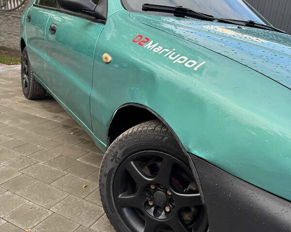 Зеленый Дэу Ланос, объемом двигателя 2 л и пробегом 220 тыс. км за 2900 $, фото 1 на Automoto.ua