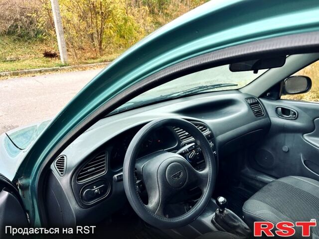 Дэу Ланос 1998 в Харькове на Automoto.ua Зеленый Дэу Ланос, объемом двигателя 1.5 л и пробегом 300 тыс. км за 1350 $, фото 4 на Automoto.ua