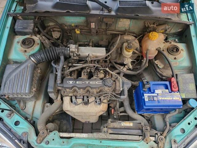 Зеленый Дэу Ланос, объемом двигателя 1.5 л и пробегом 268 тыс. км за 1200 $, фото 6 на Automoto.ua