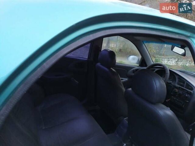 Зеленый Дэу Ланос, объемом двигателя 1.5 л и пробегом 245 тыс. км за 1100 $, фото 3 на Automoto.ua